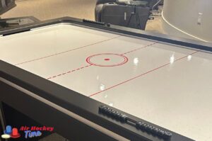 Can you pass the middle line in air hockey