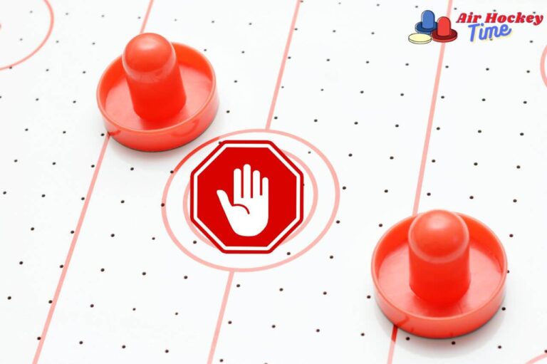 Can you stop the puck with the mallet in air hockey